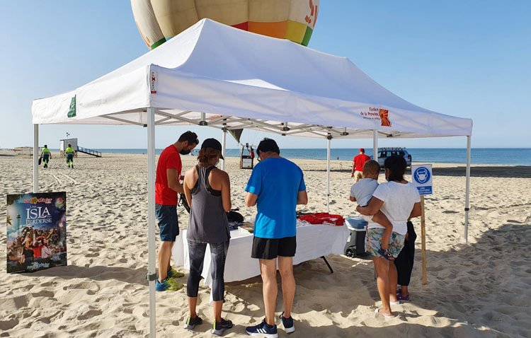 Utrera promociona su oferta turística en las playas de la mano de la Diputación